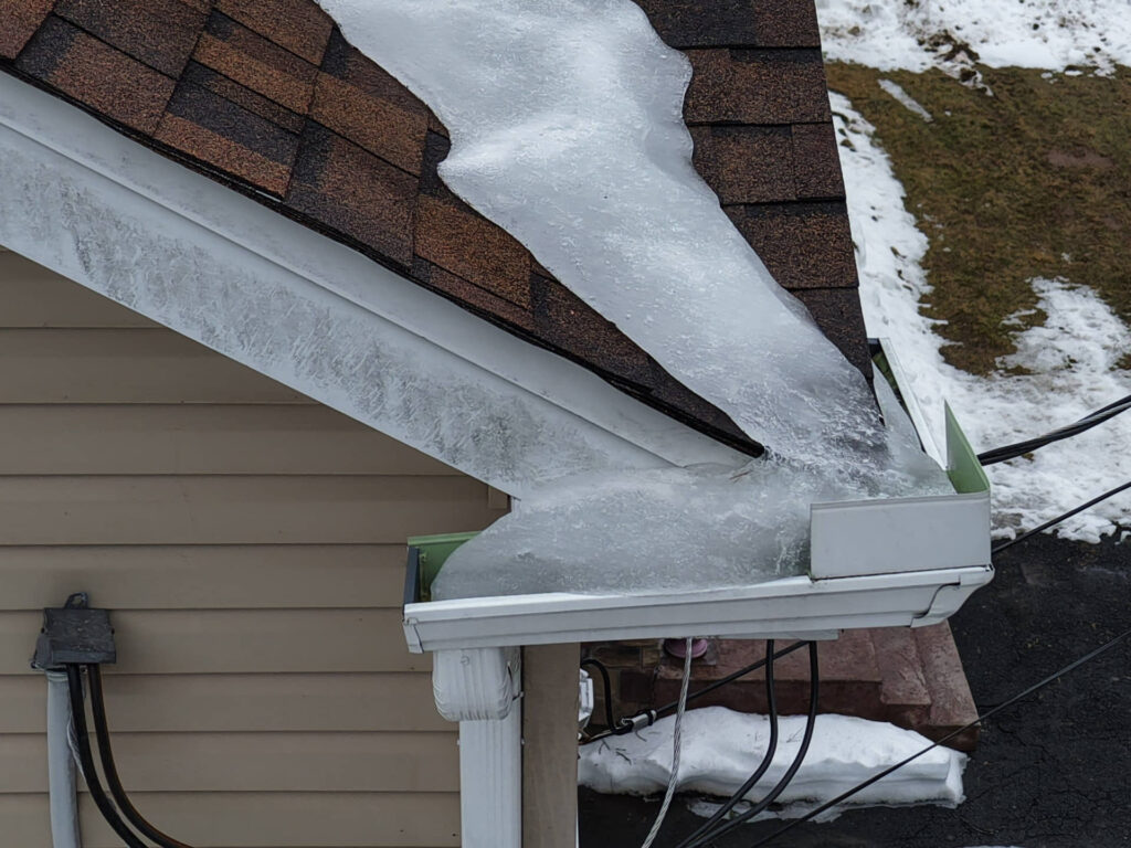 Ice damming on roof causing damage